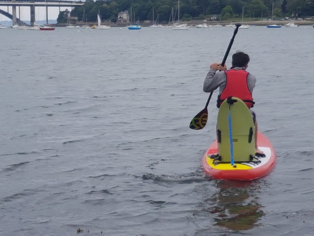 Paddle avec siège adapté.